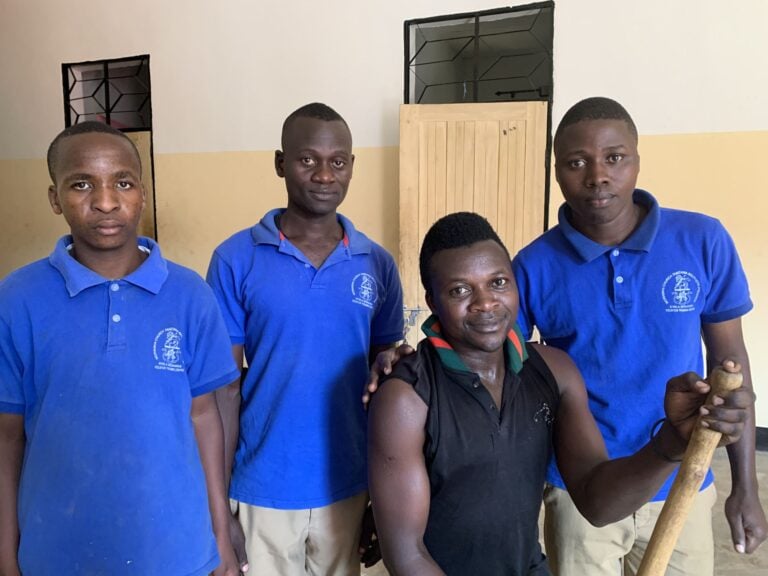 Samwel and staff at the vocational school in Kyela. Photo Adrienne Sweetman, Mission 21