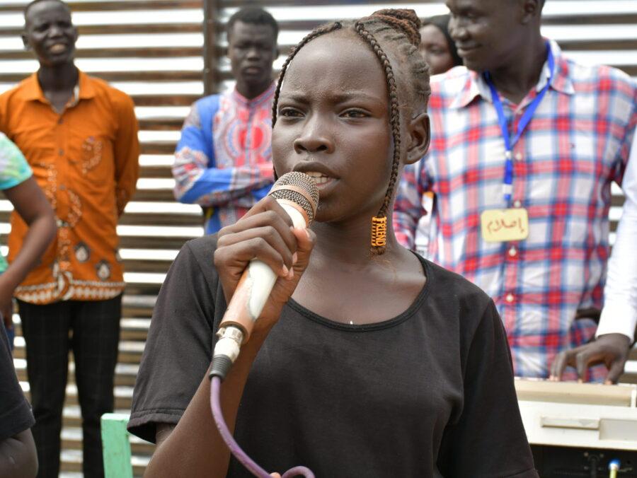 Young woman at the microphone