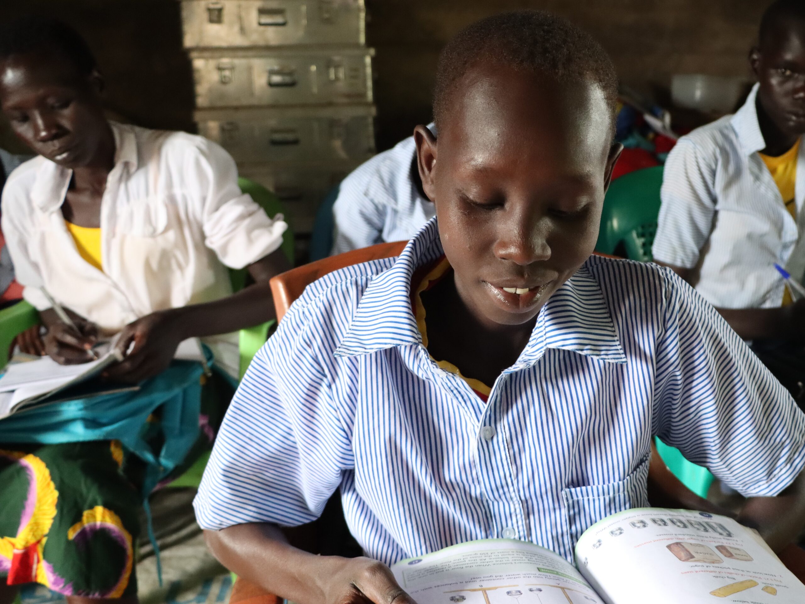 A pupil studying in the Pochalla region.